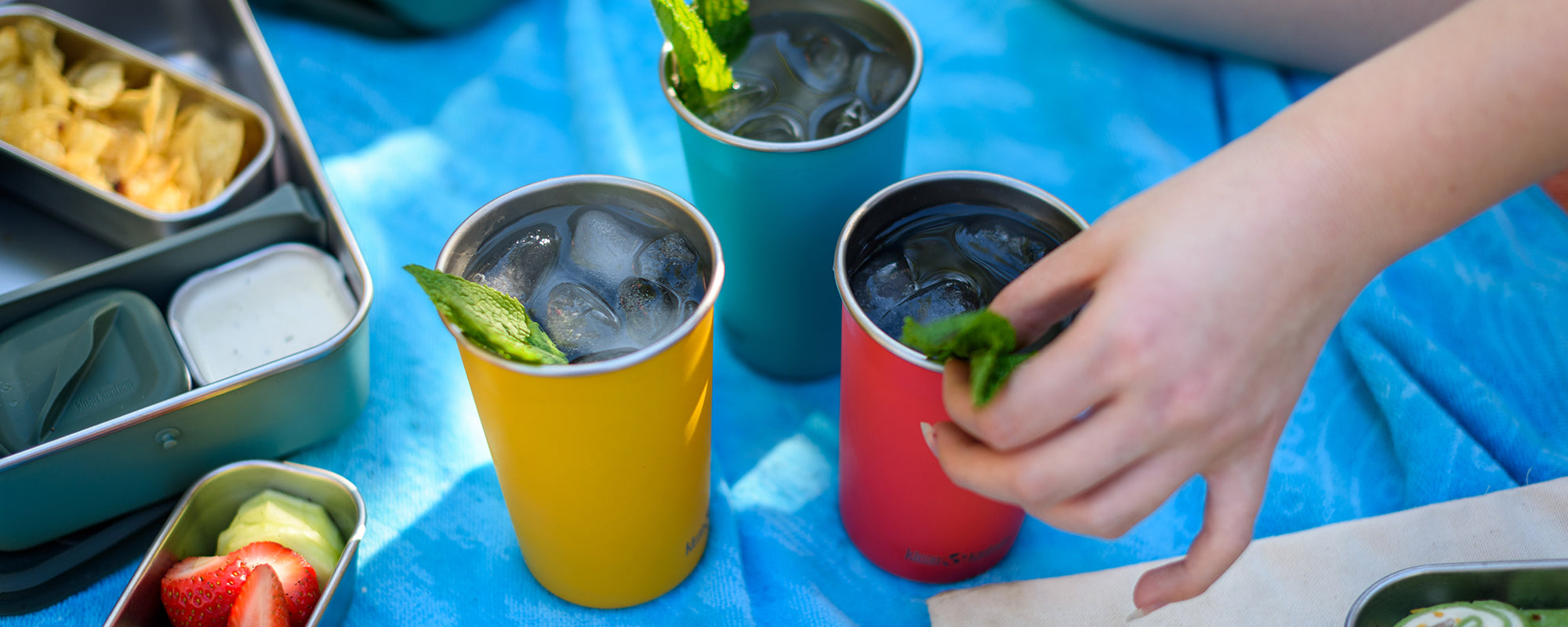 colorful steel cups with cocktails
