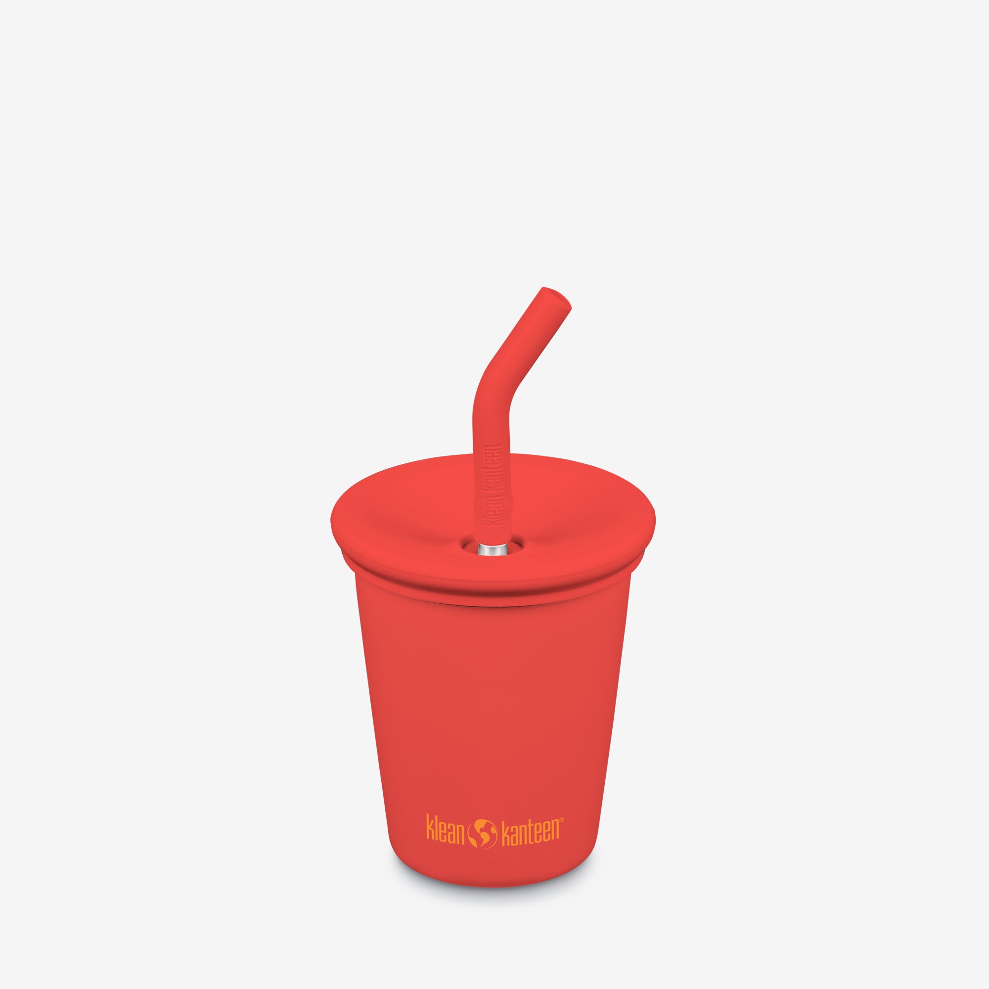 Red silicone cup with straw on a light gray background