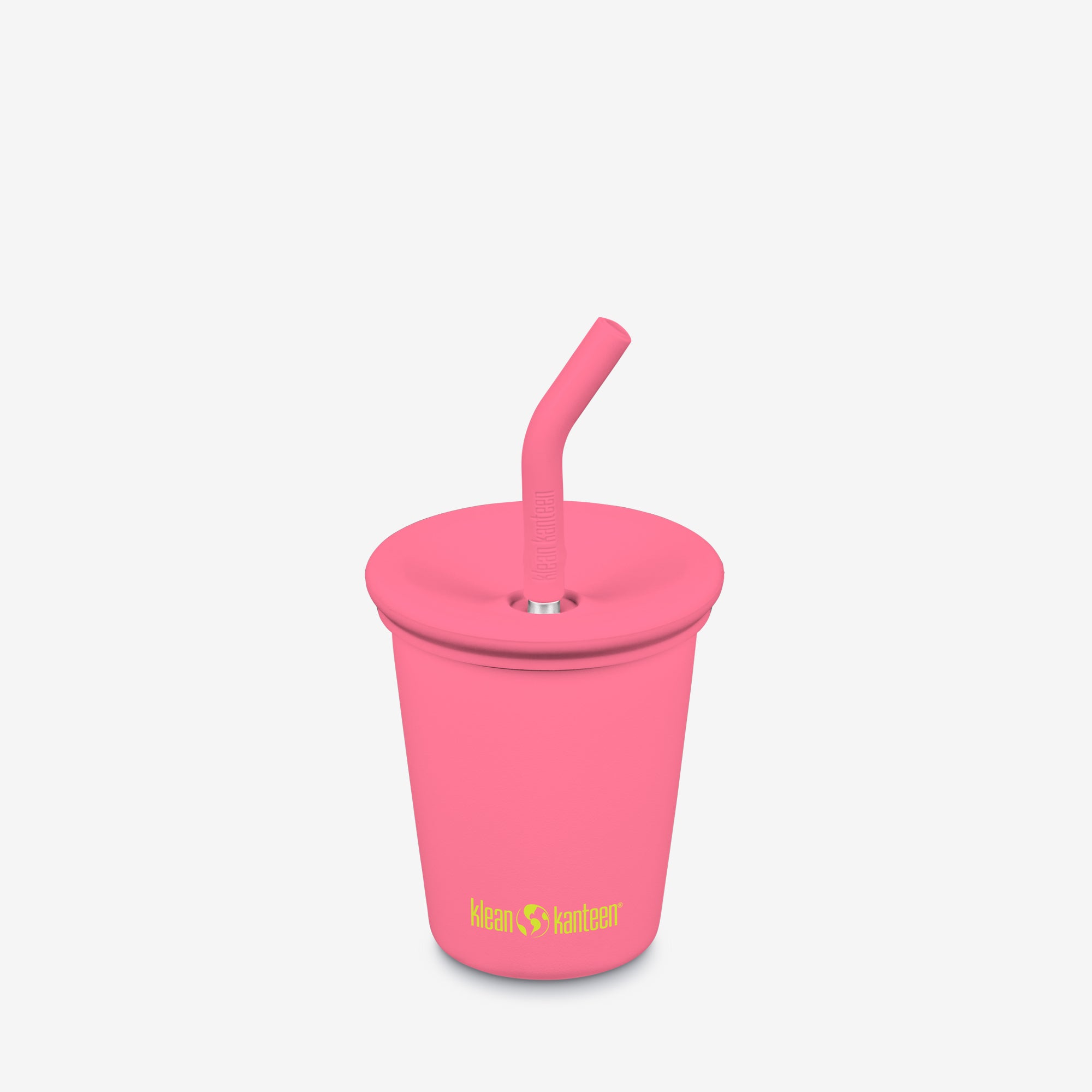 Pink tumbler with a straw on a light gray background