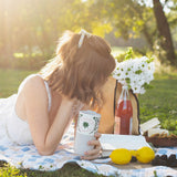 Anna Vaus drinking from her custom tumbler