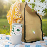 Anna Vaus 'Happy Trails' 16oz Tumbler on blanket at picnic