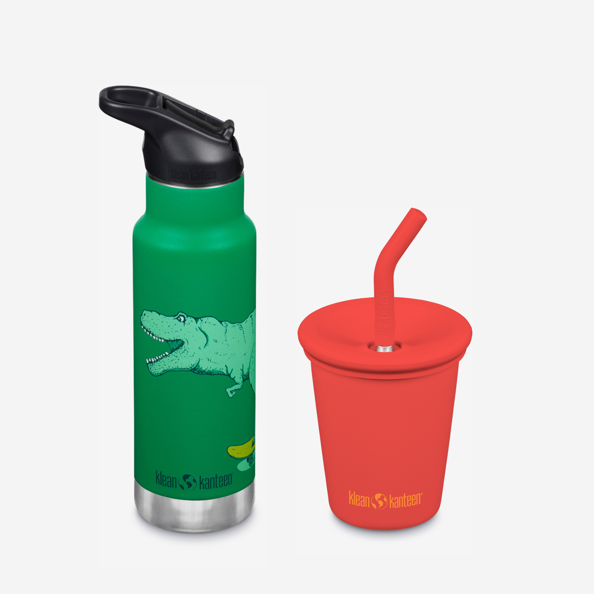 Green water bottle with alligator design and red cup with straw on a light gray background