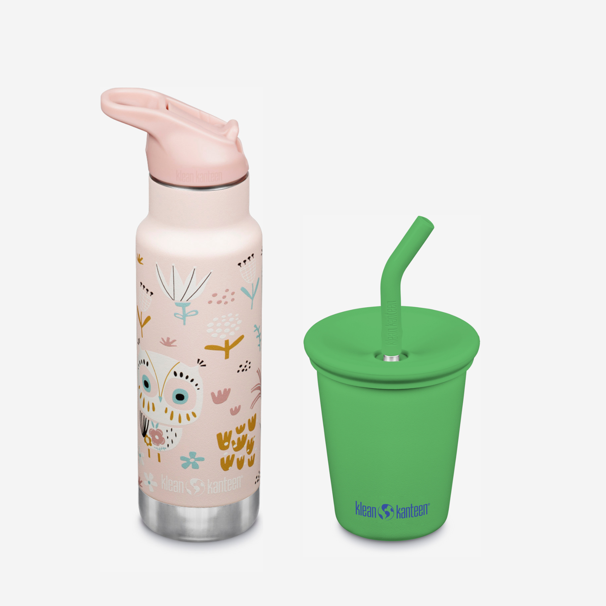 Pink water bottle with animal patterns and green sippy cup with straw lid on a white background