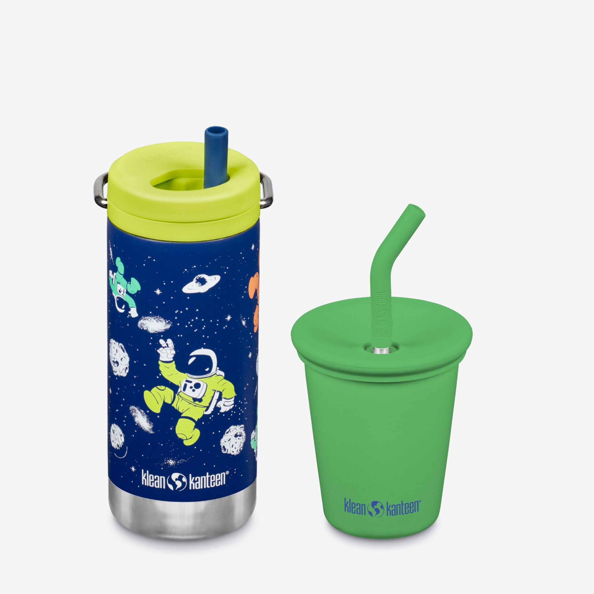 Two children's cups with straws, one blue with space-themed design and the other green, on a white background.
