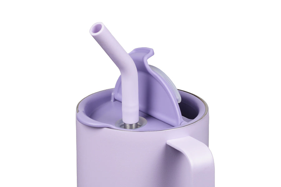 Close up of tumbler with straw and lid open