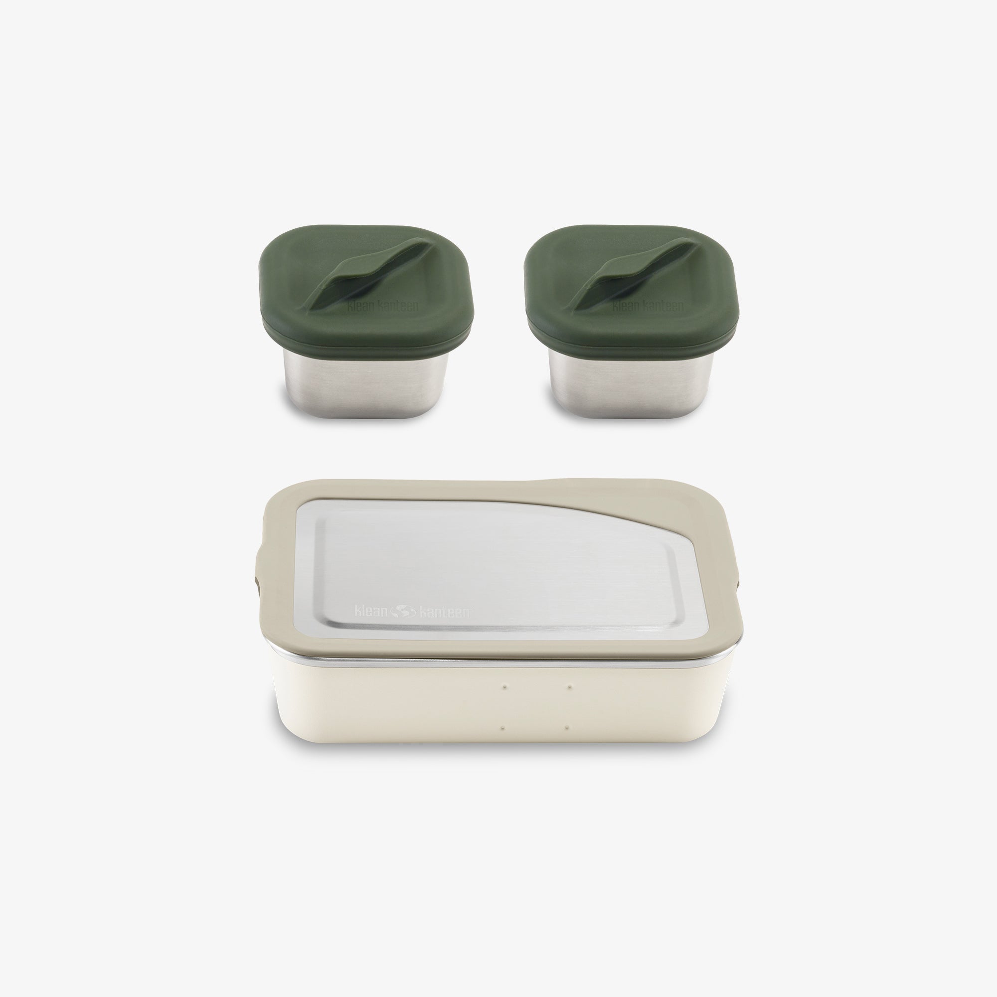 Set of three containers with green lids on a white background