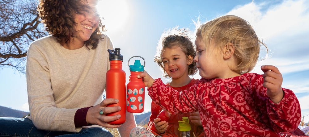 Kids' Sippy Bottle at Family Picnic