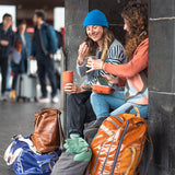 Women travelling with food boxes and snacks