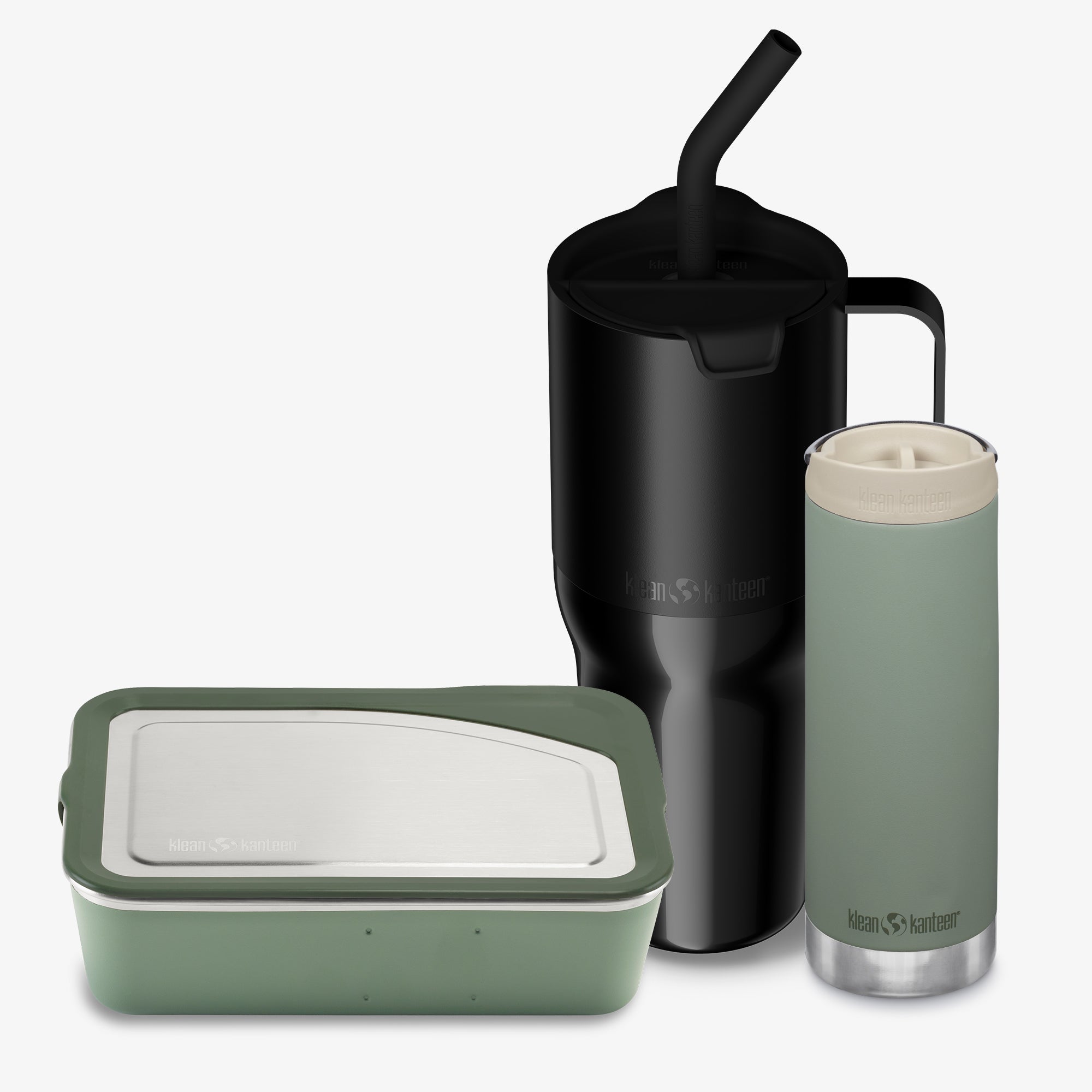 Set of reusable containers including a black mug, green bottle, and green container on a white background.