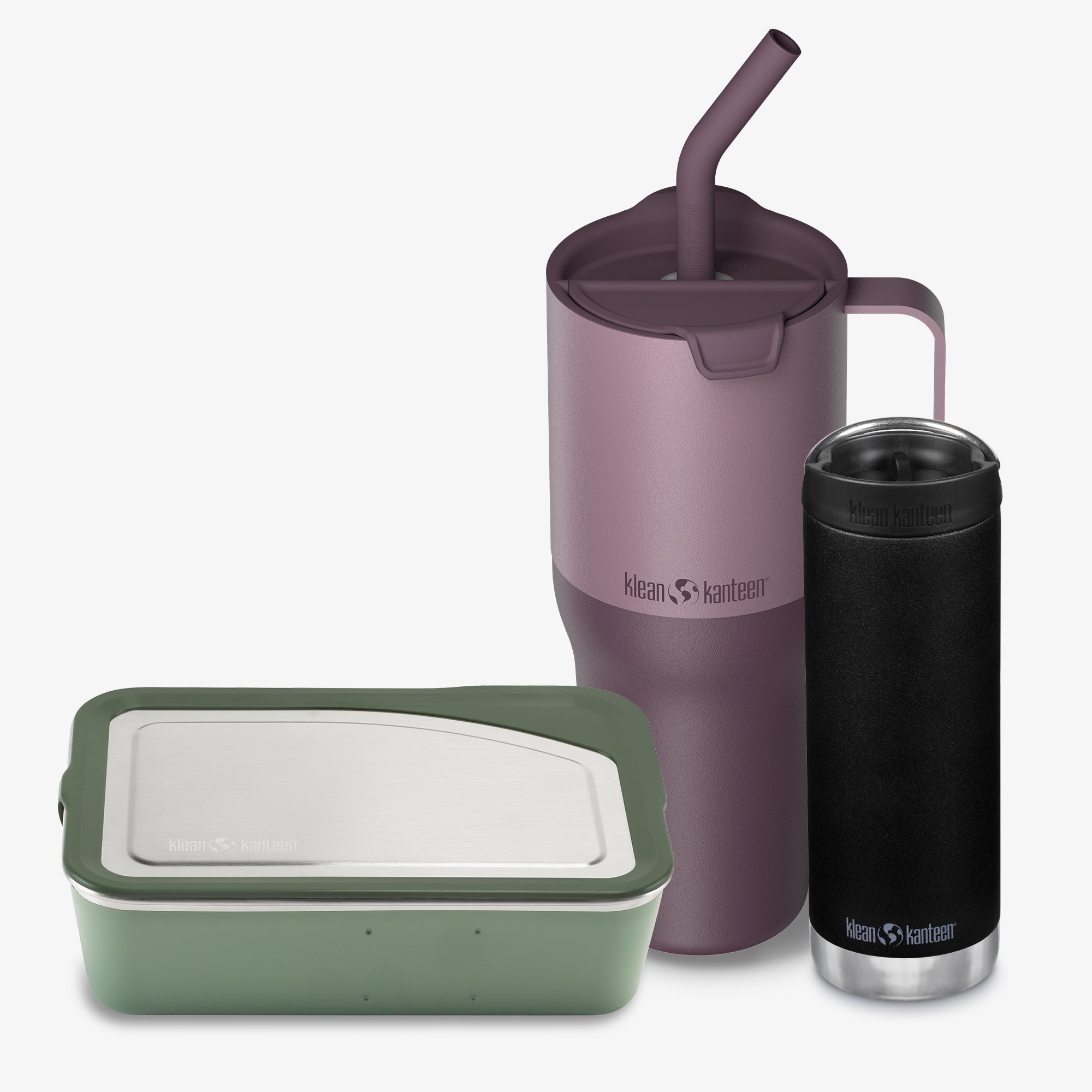 Purple insulated tumbler with straw and black insulated mug with green container on a white background
