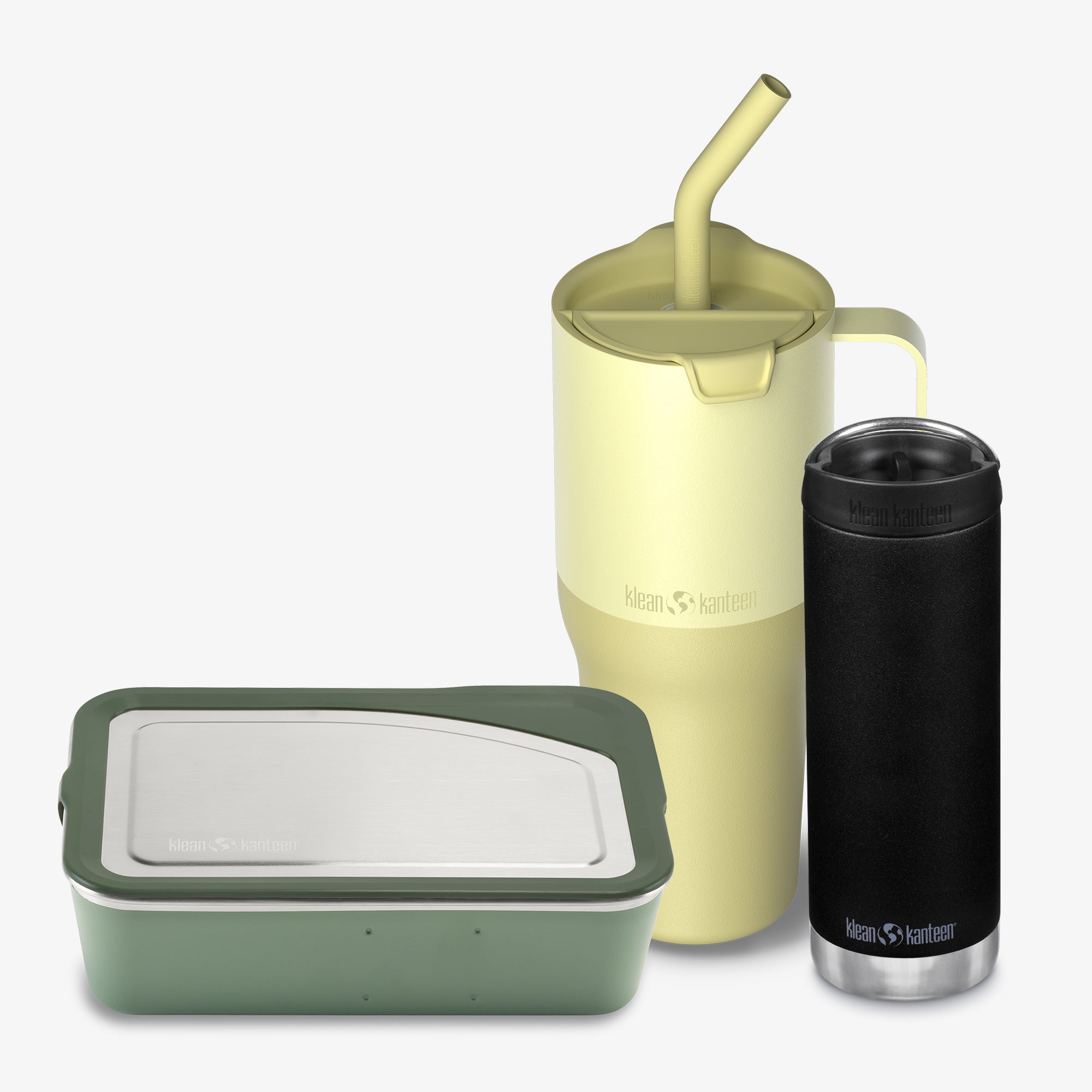 Two insulated containers, one green and one beige with a straw lid, on a white background.