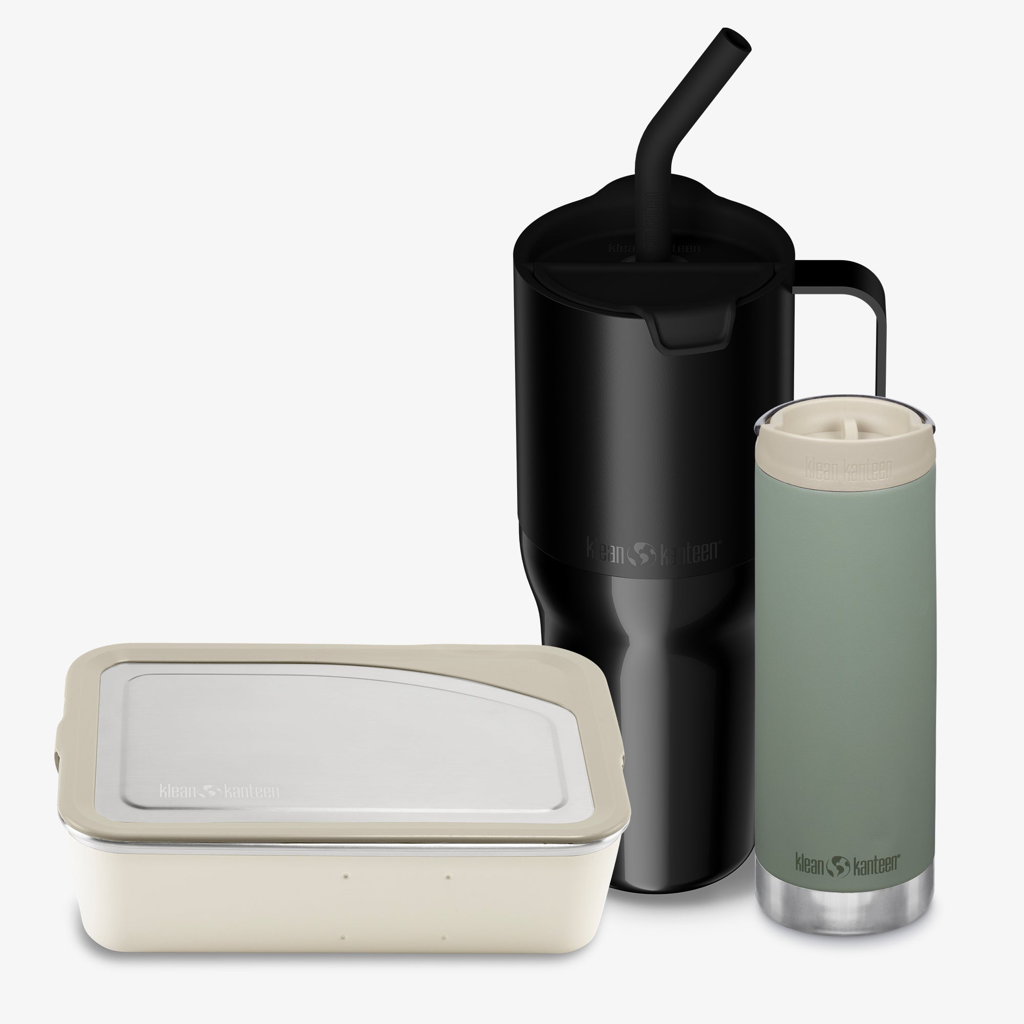 Set of reusable containers including a black mug, green tumbler, and beige container on a white background.