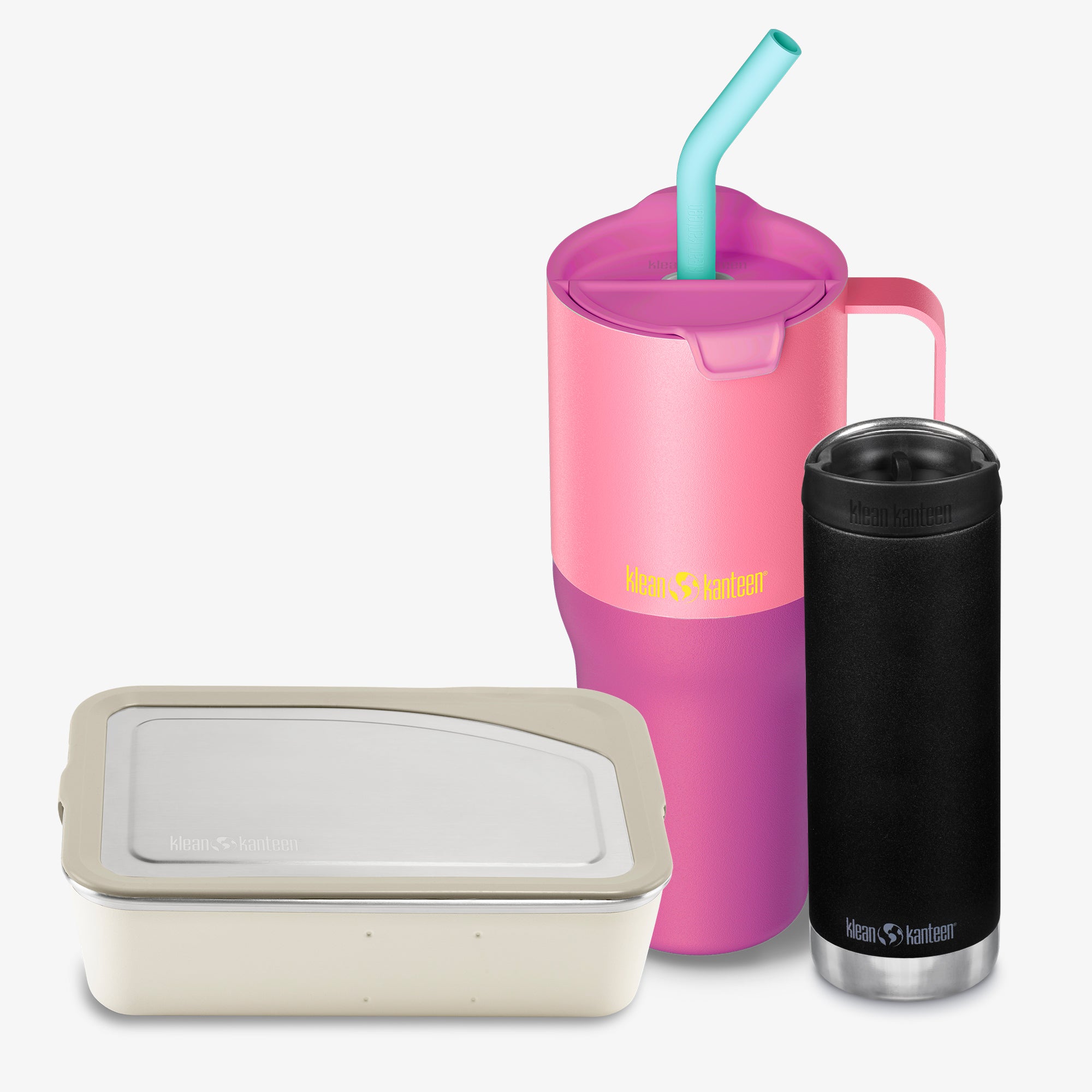 Pink tumbler with straw, beige container, and black insulated mug on a white background