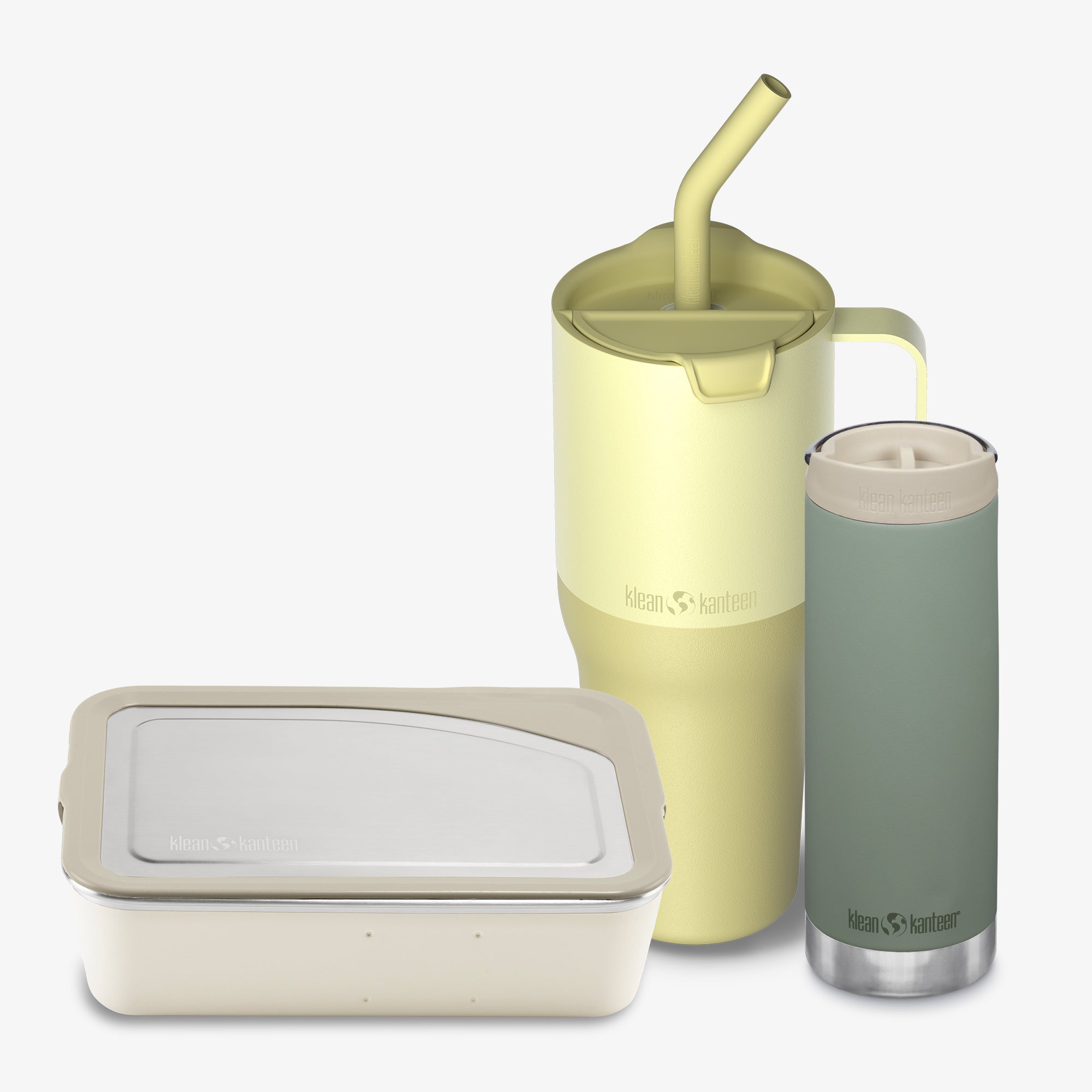 Set of three insulated containers with lids and a straw on a white background