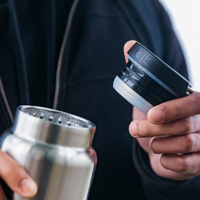 Close up of water bottle with lid off