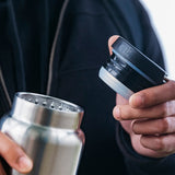Close up of water bottle with lid off
