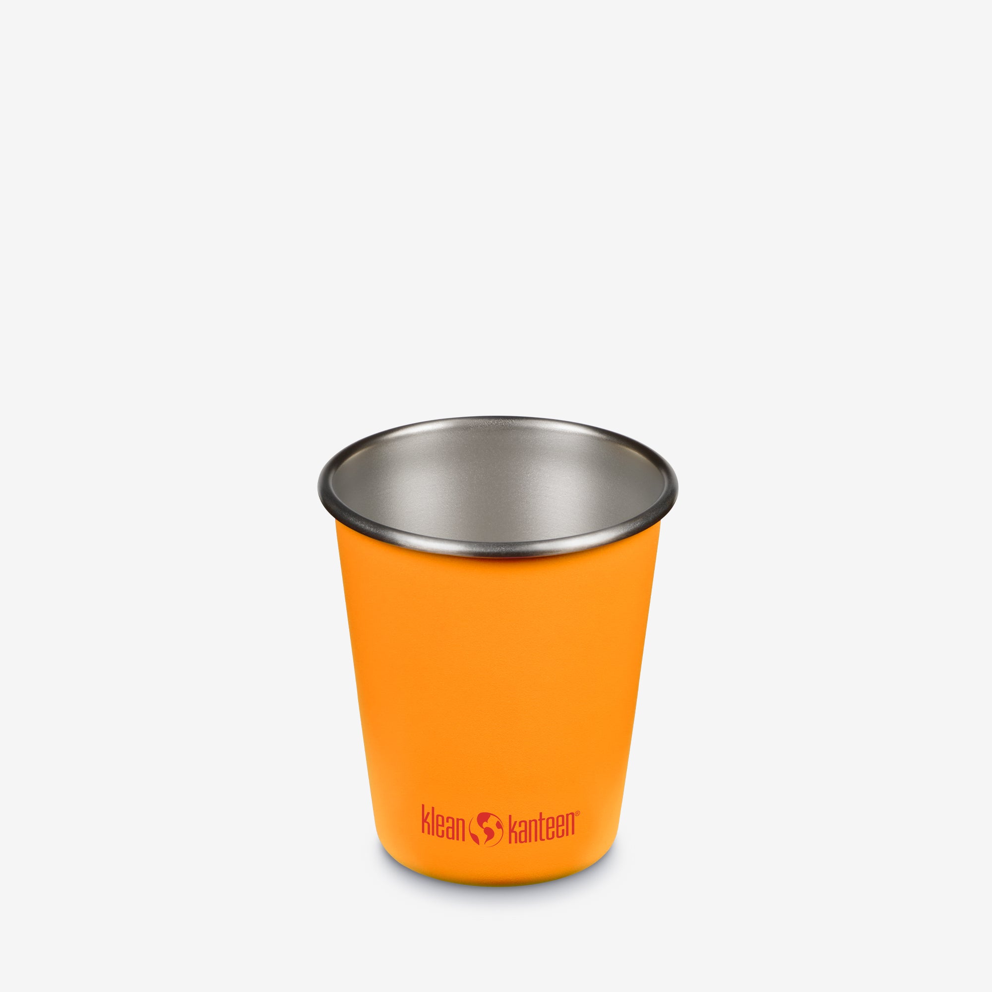 Orange Klean Kanteen cup with silver rim on a white background