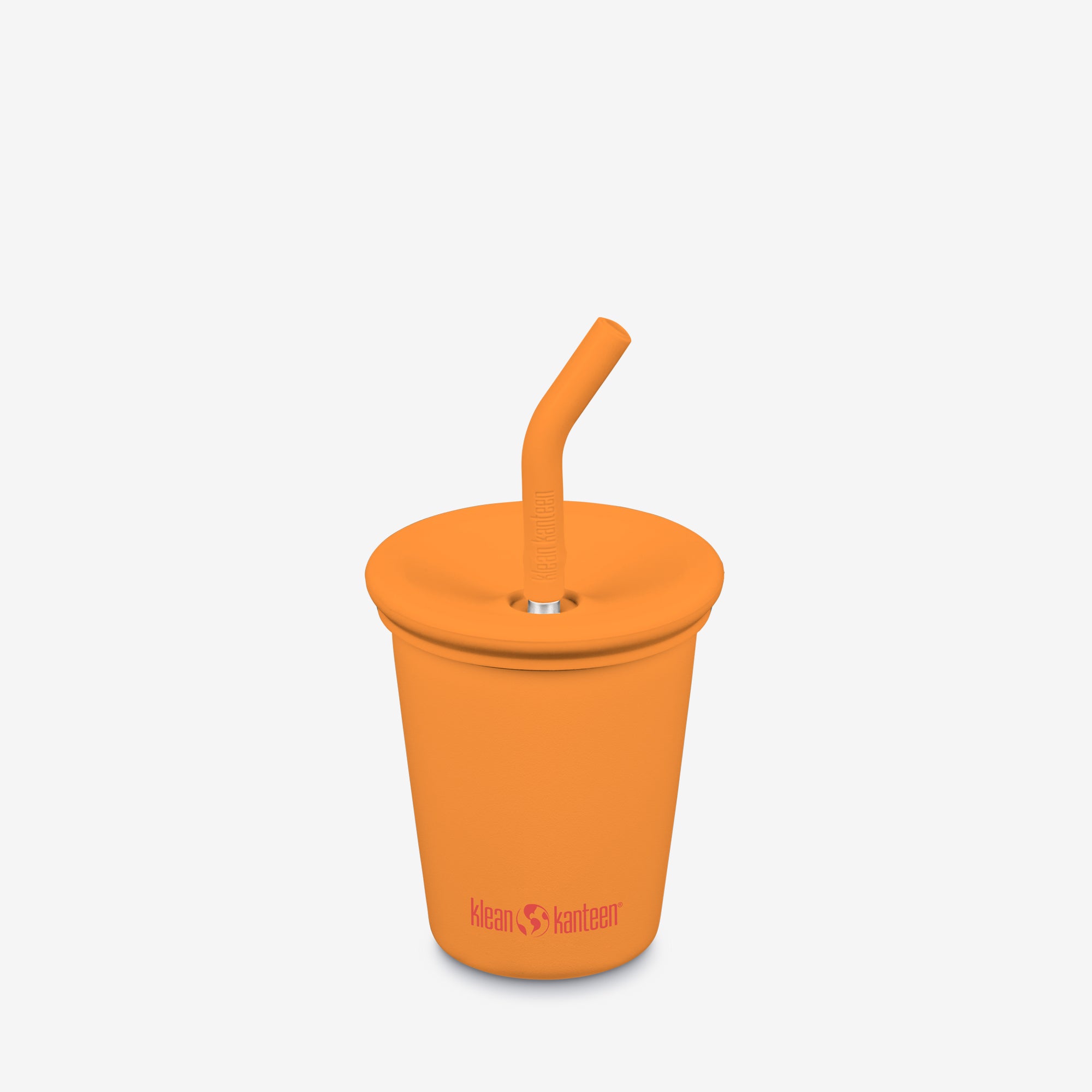 Orange tumbler with a straw on a white background