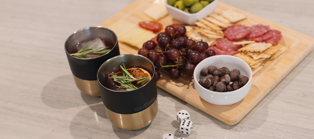 Lowball tumblers and cocktails with charcuterie board