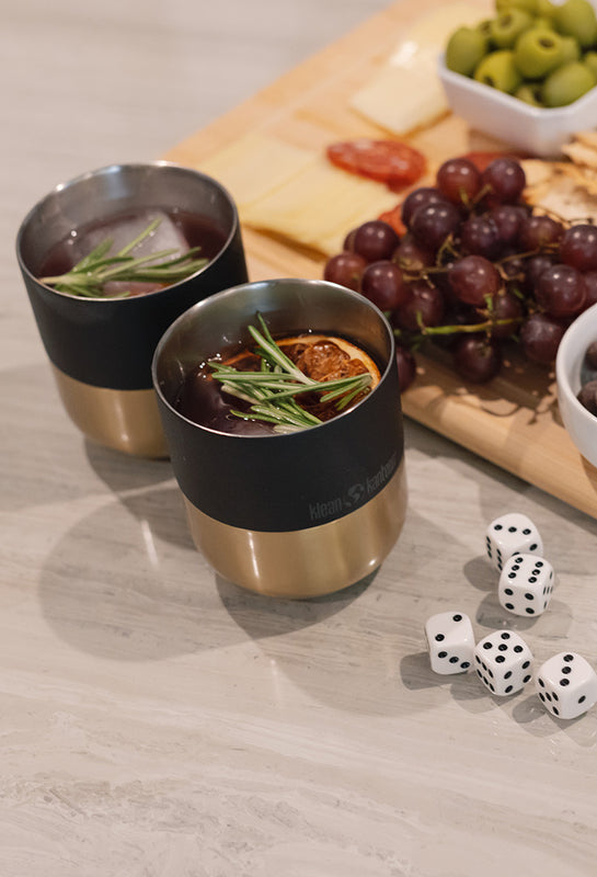 Lowball tumblers and cocktails with charcuterie board