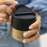 Black and gold lowball tumbler with flip lid