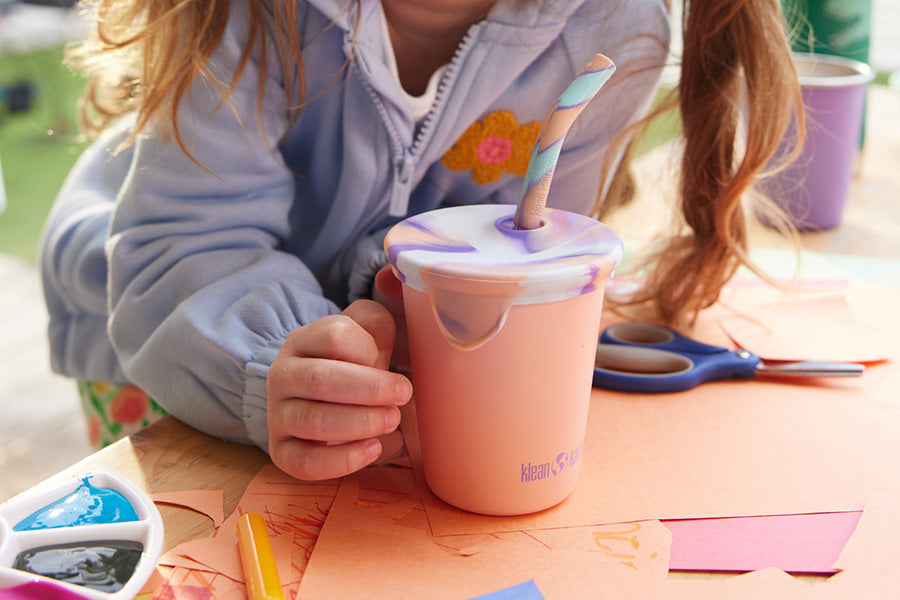 Close up of  sippy cup and straw