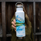 Earth Day Bottle in hand - mountain graphic