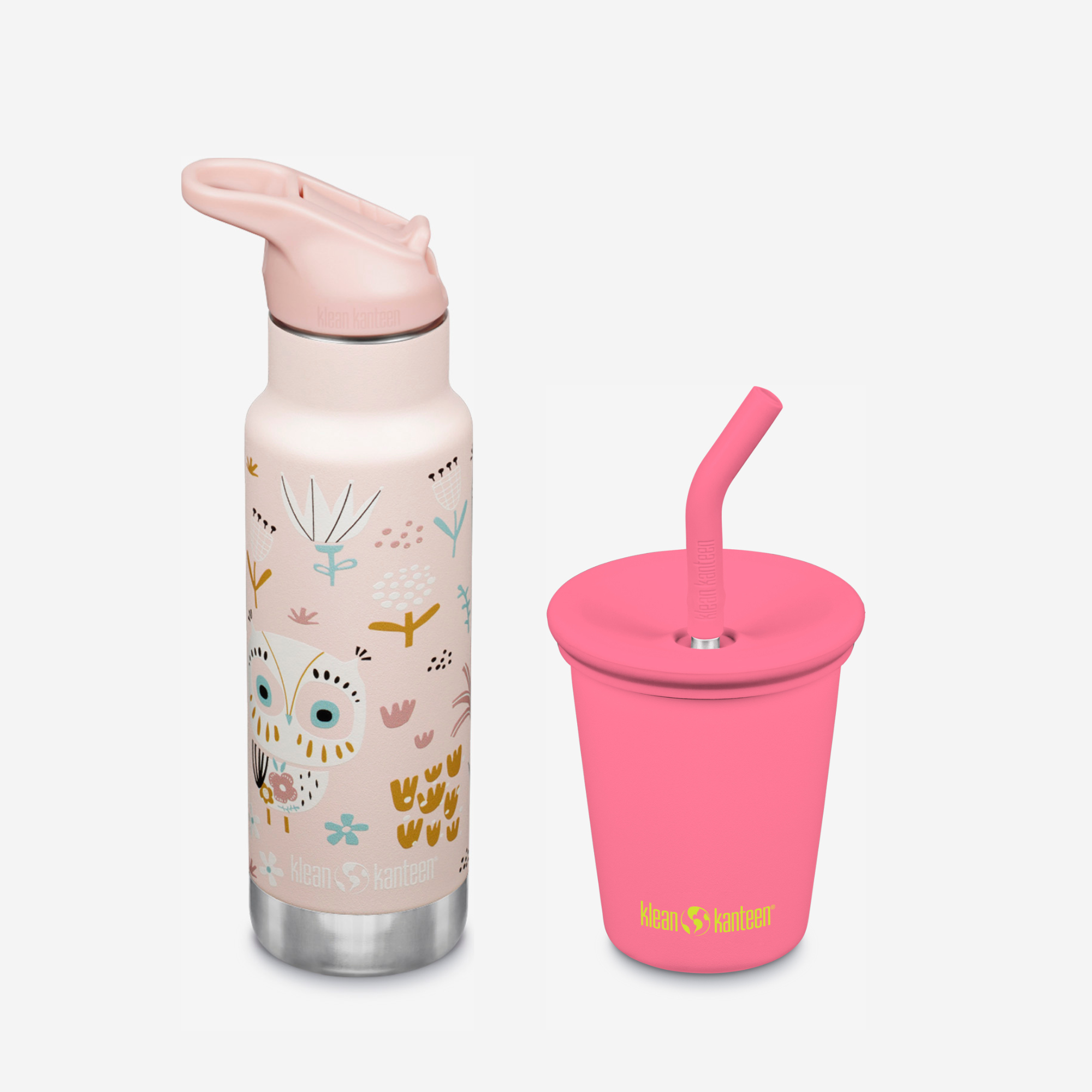 Pink water bottle with animal design and pink cup with straw on a white background