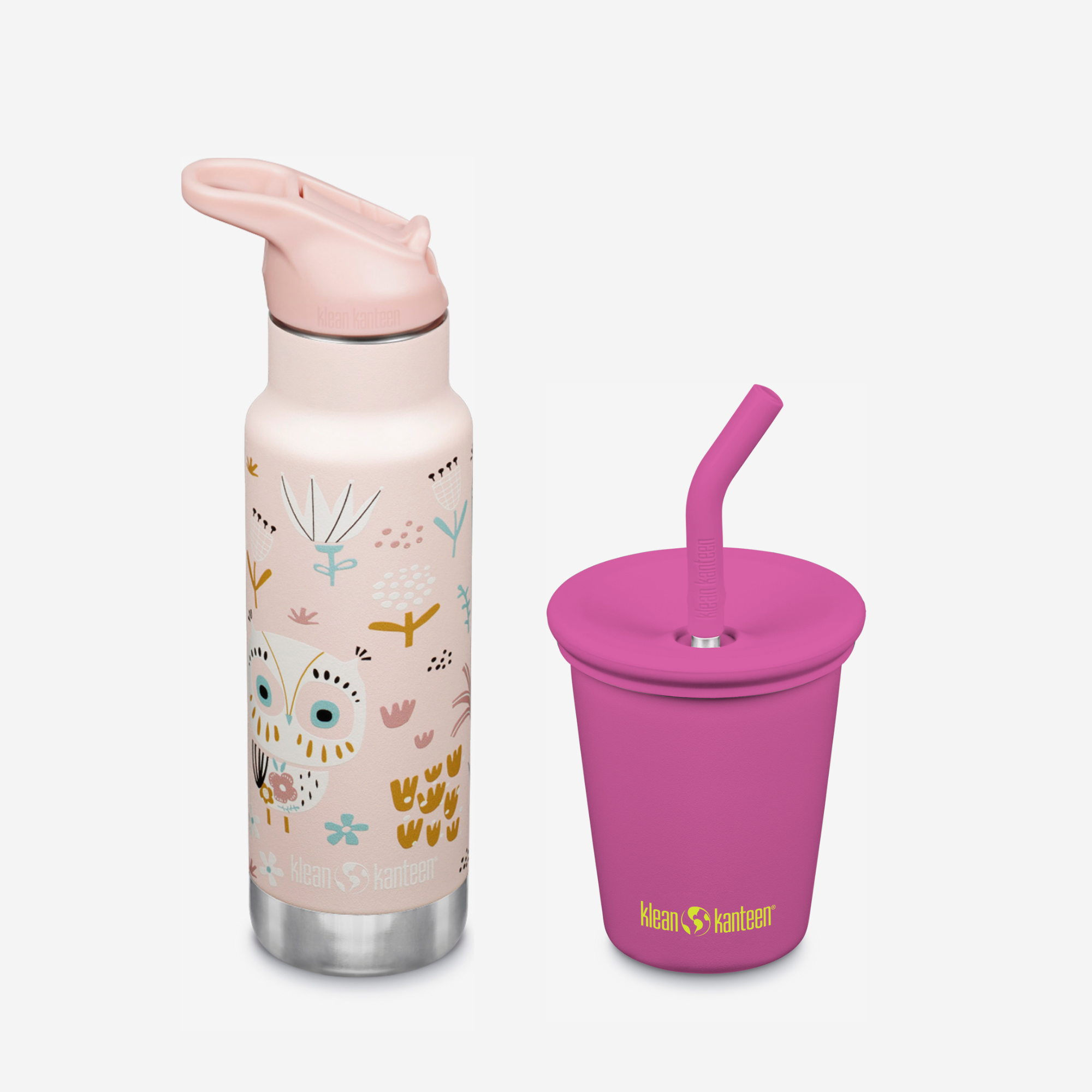Pink water bottle with animal patterns and pink cup with straw on a white background