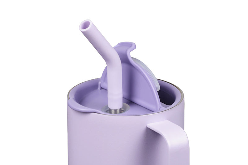 Close up of tumbler with straw and lid open