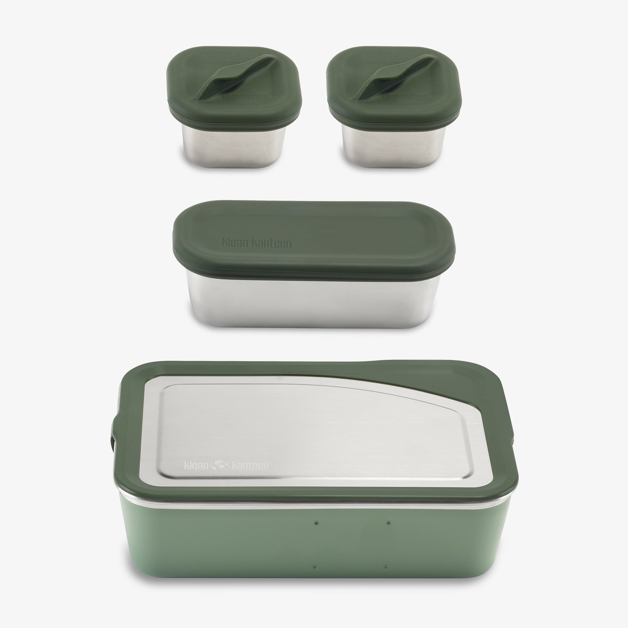 Set of green and white food containers with lids on a white background