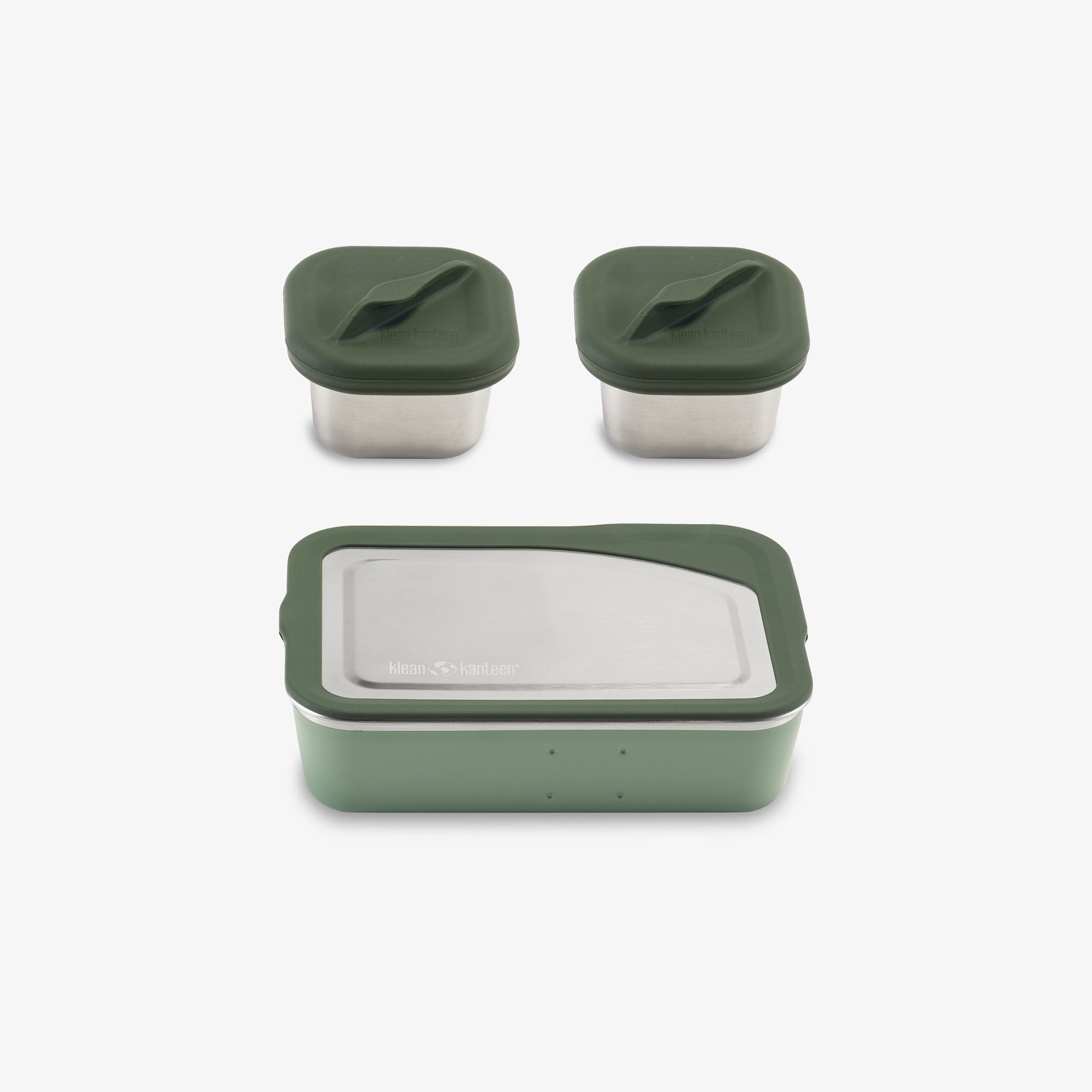 Set of three containers with green lids on a white background