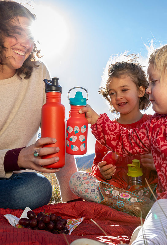 Kids' Sippy Bottle at Family Picnic