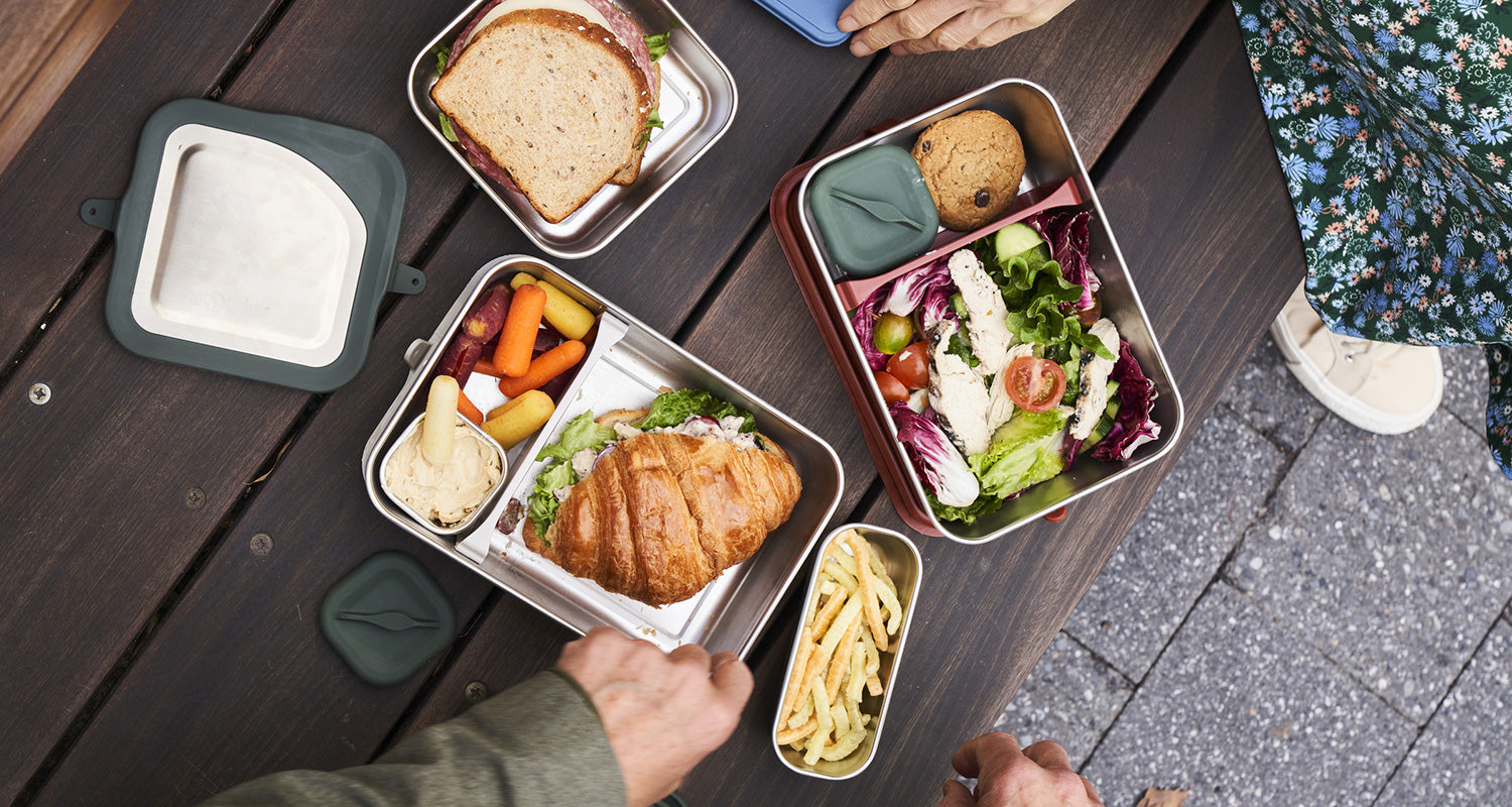 Steel lunch boxes and food containers - top view