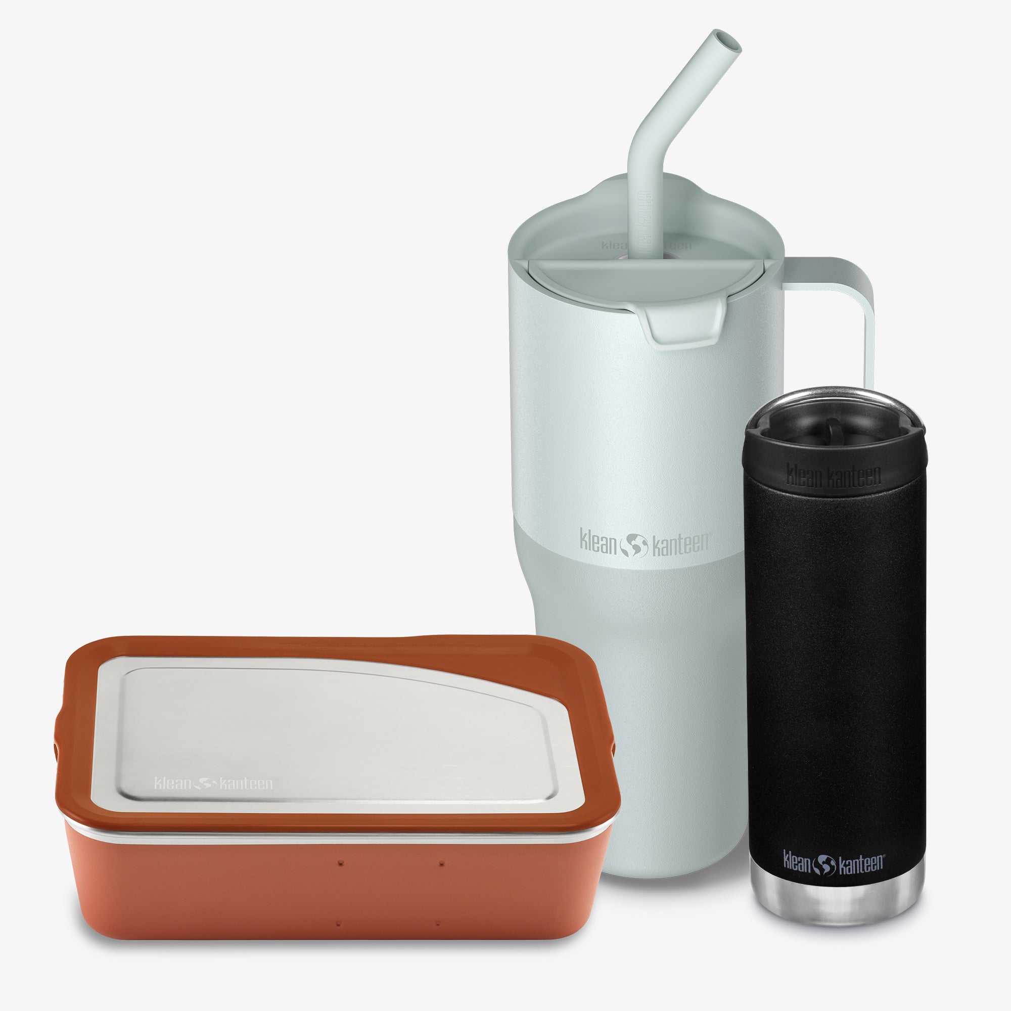 Set of reusable containers including a white tumbler with straw, black insulated bottle, and brown container on a white background.
