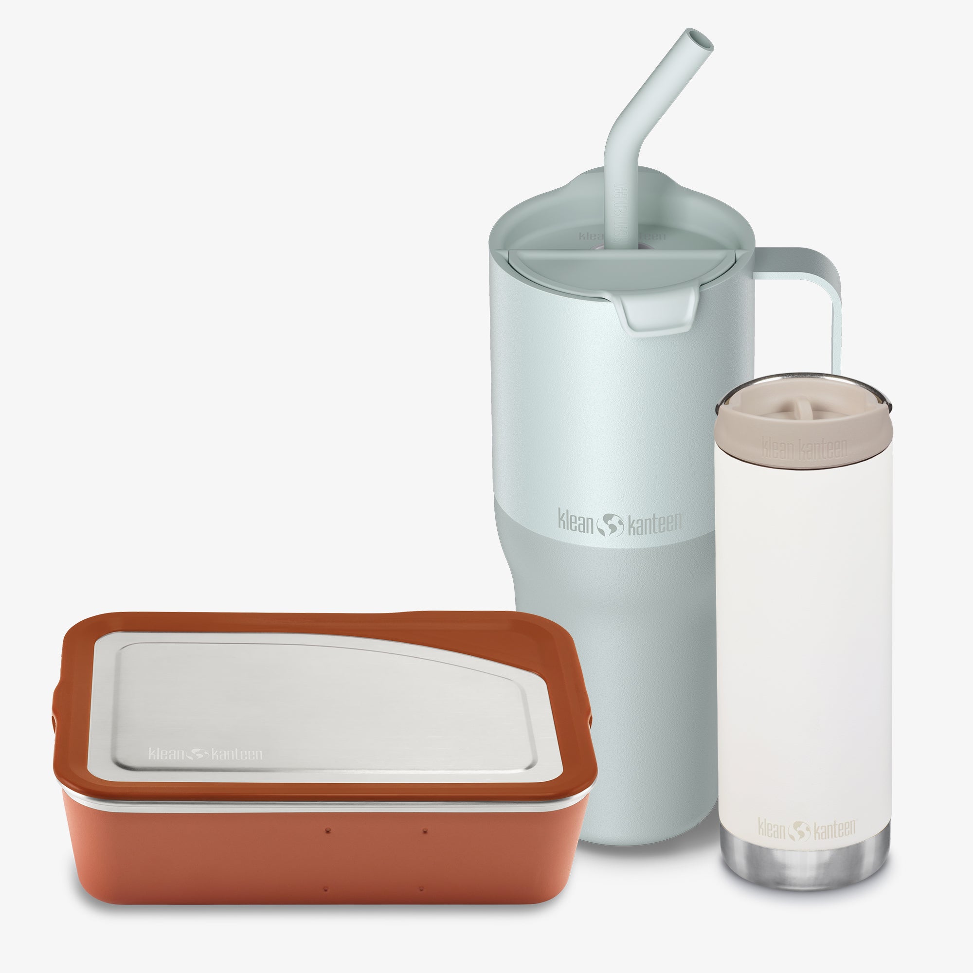 Set of reusable containers with a pitcher and a glass on a white background
