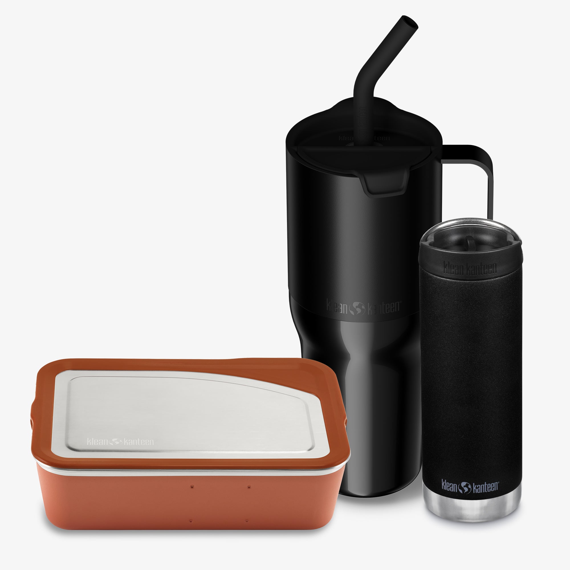 Black insulated mug, tumbler, and brown container on a white background