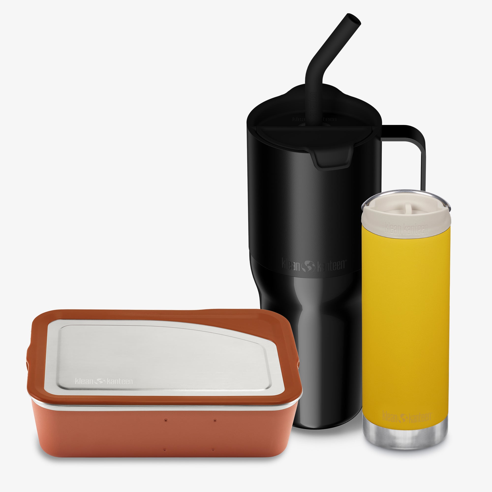 Black insulated tumbler with straw, yellow insulated cup, and brown insulated container on a white background