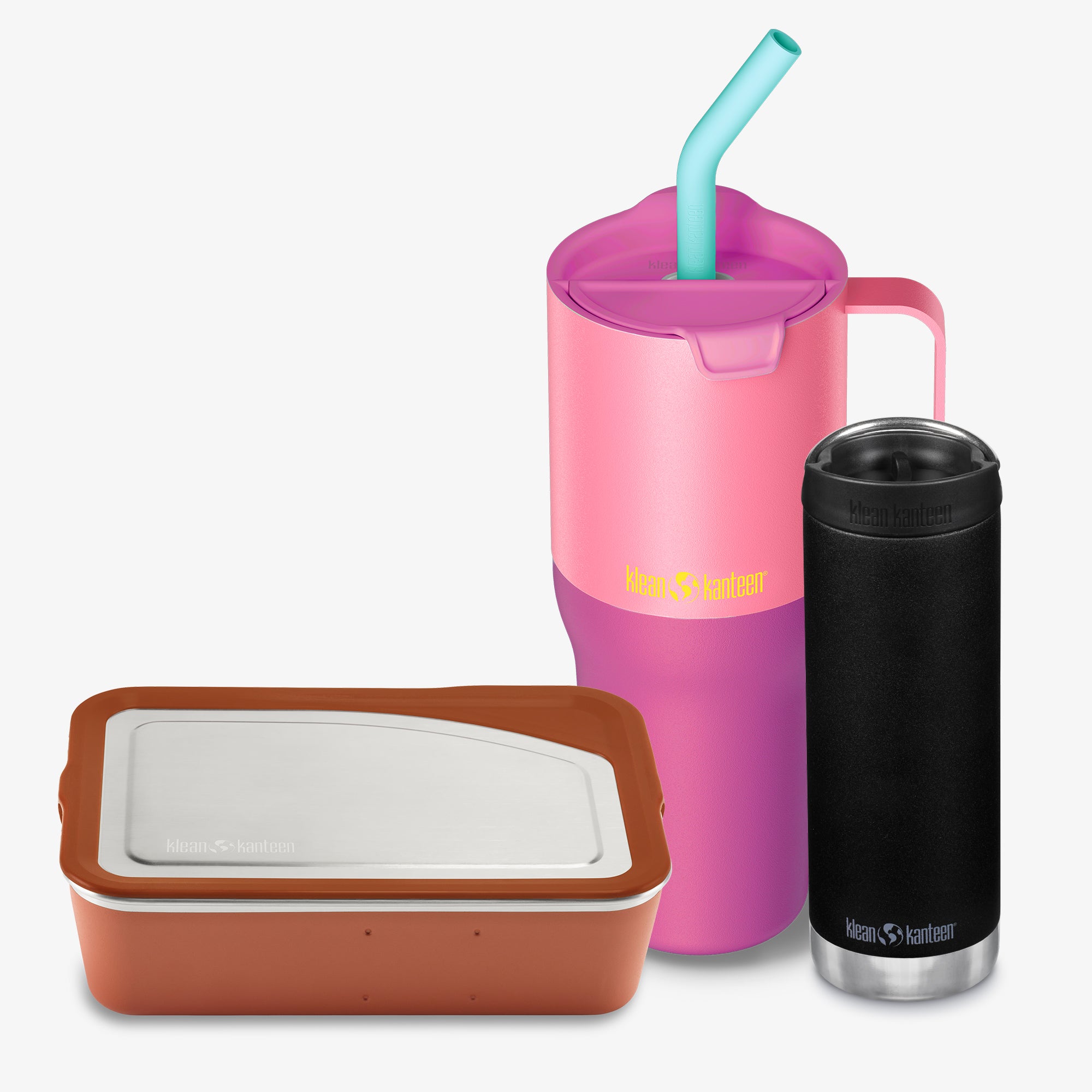 Pink tumbler with straw, brown container, and black insulated mug on a white background