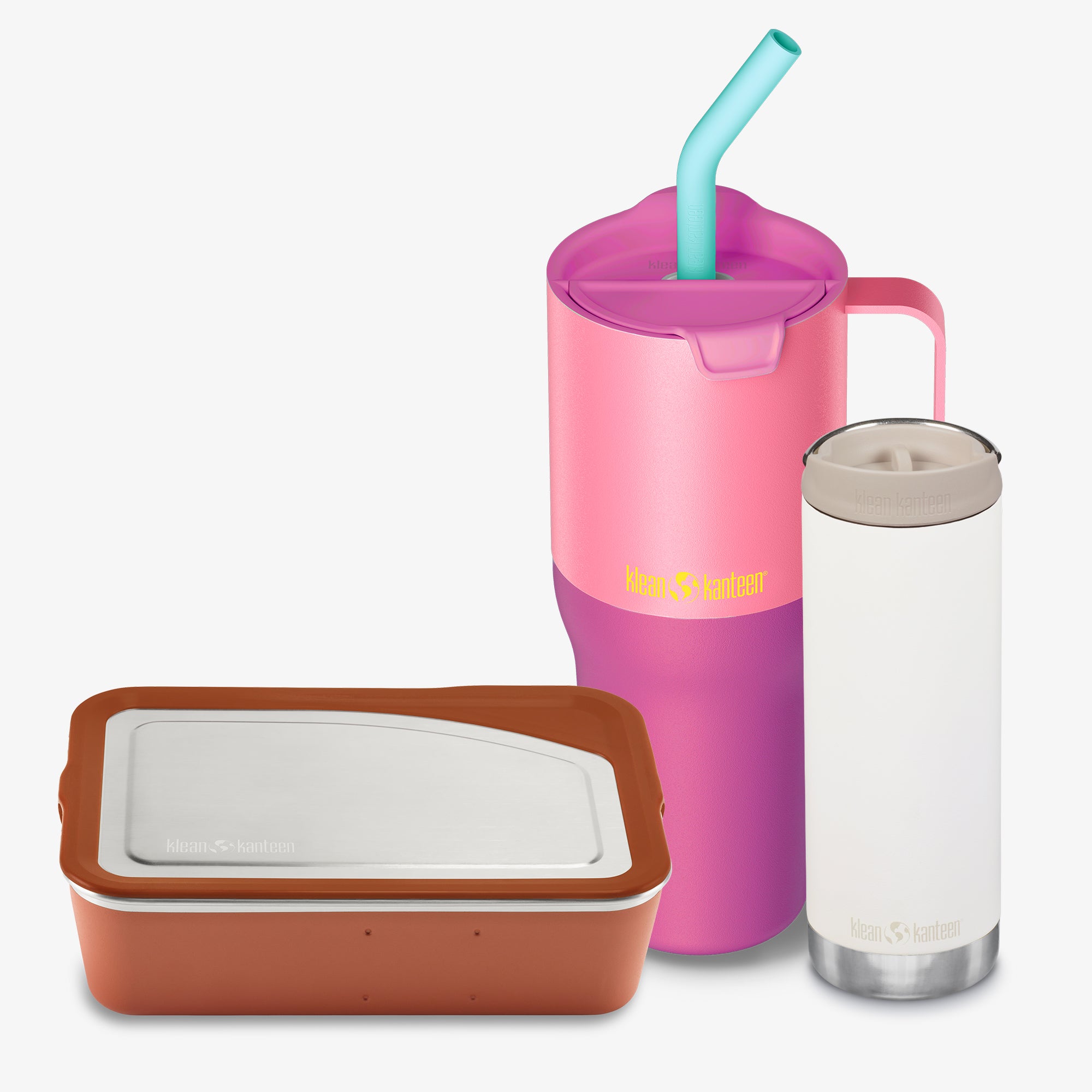 Pink tumbler with straw, brown container, and clear tumbler on a white background