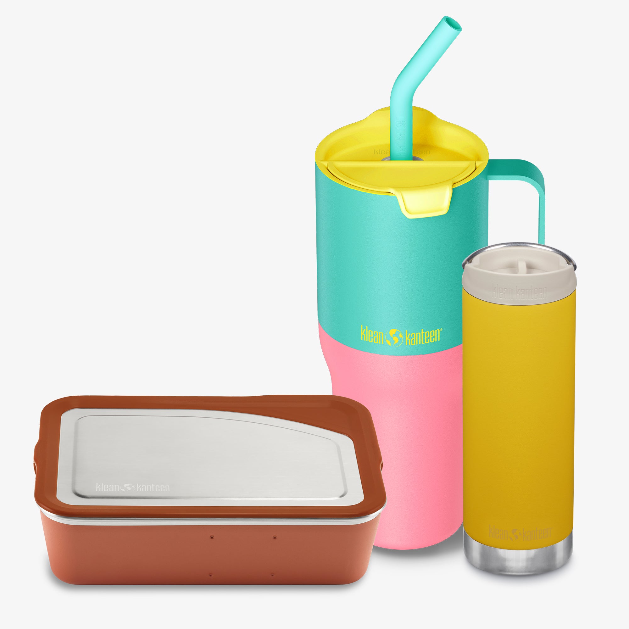 Colorful insulated drink containers with a straw and lid on a white background