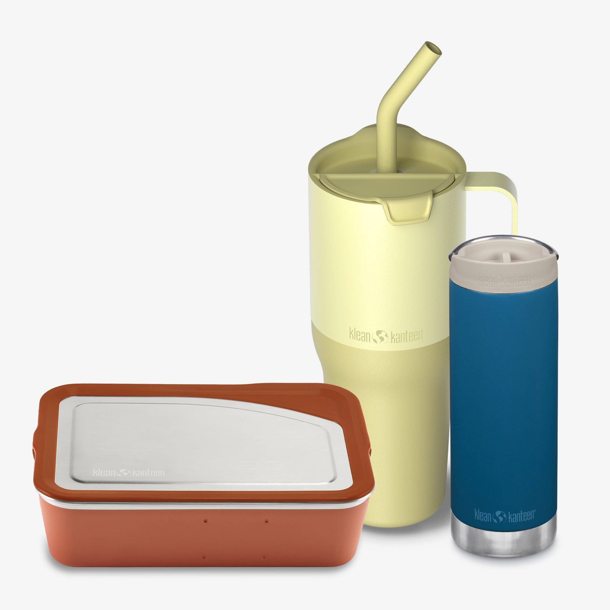 Set of insulated containers with a yellow tumbler and blue bottle on a white background