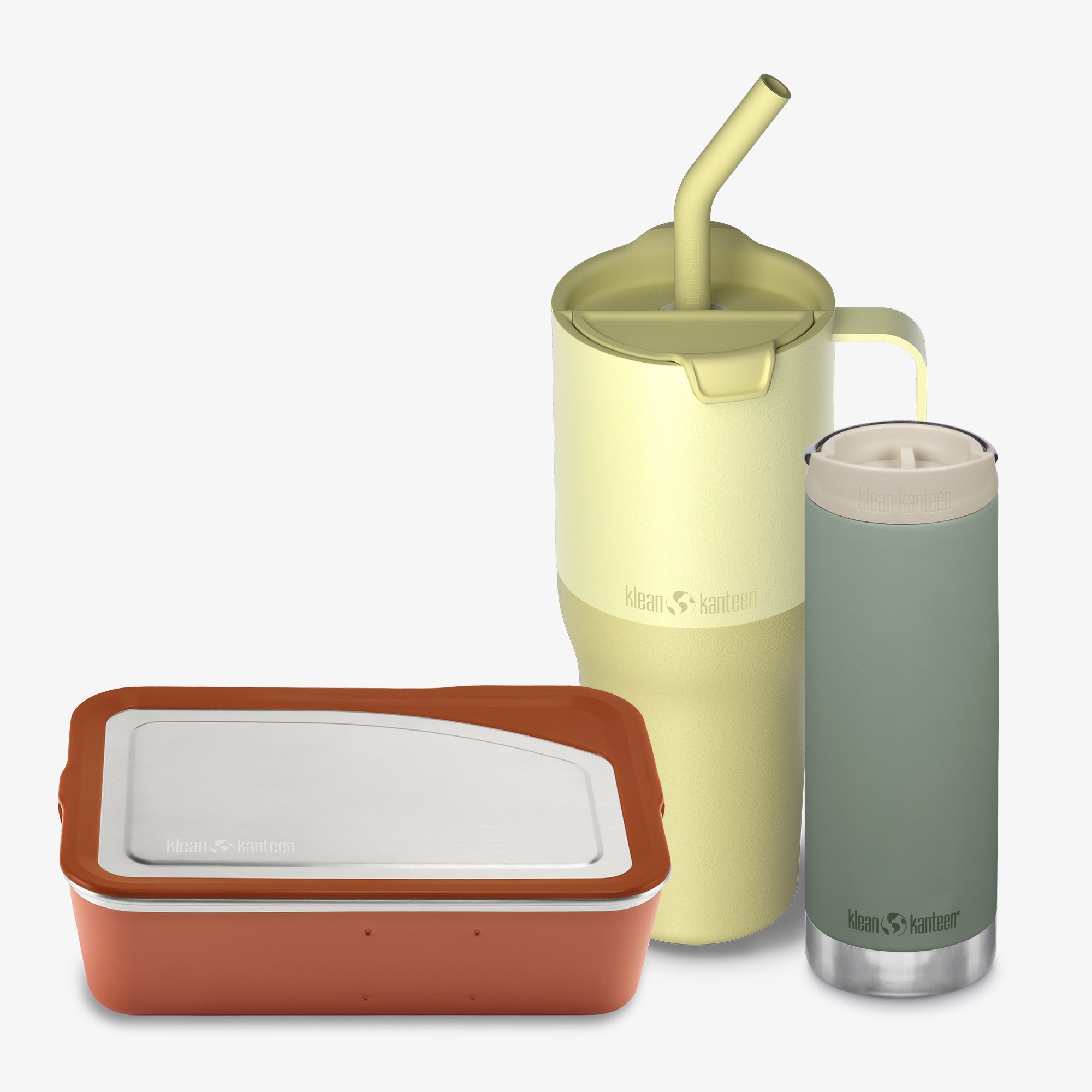 Three insulated containers with lids and a straw on a white background