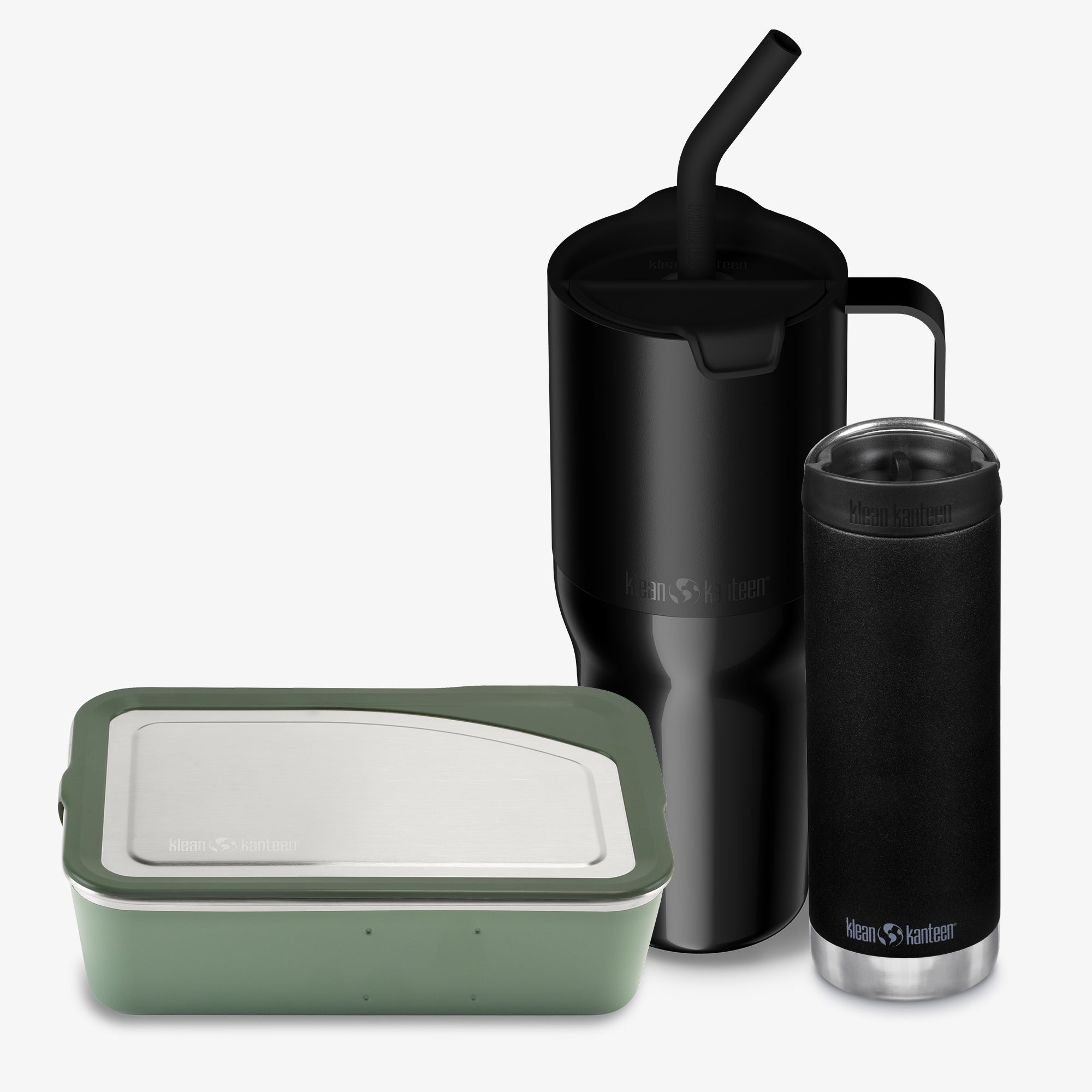 Black insulated mug, tumbler, and green food container on a white background