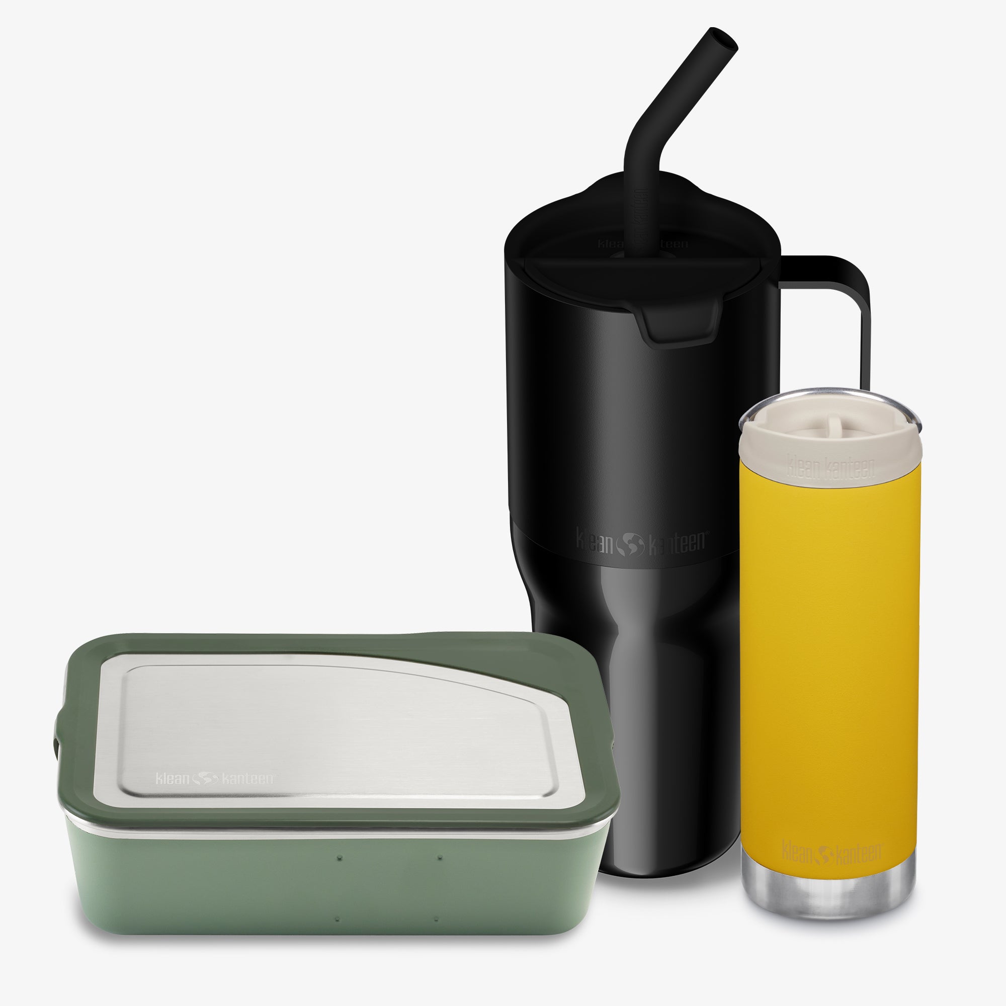 Black insulated mug with straw, yellow tumbler, and green container on a white background