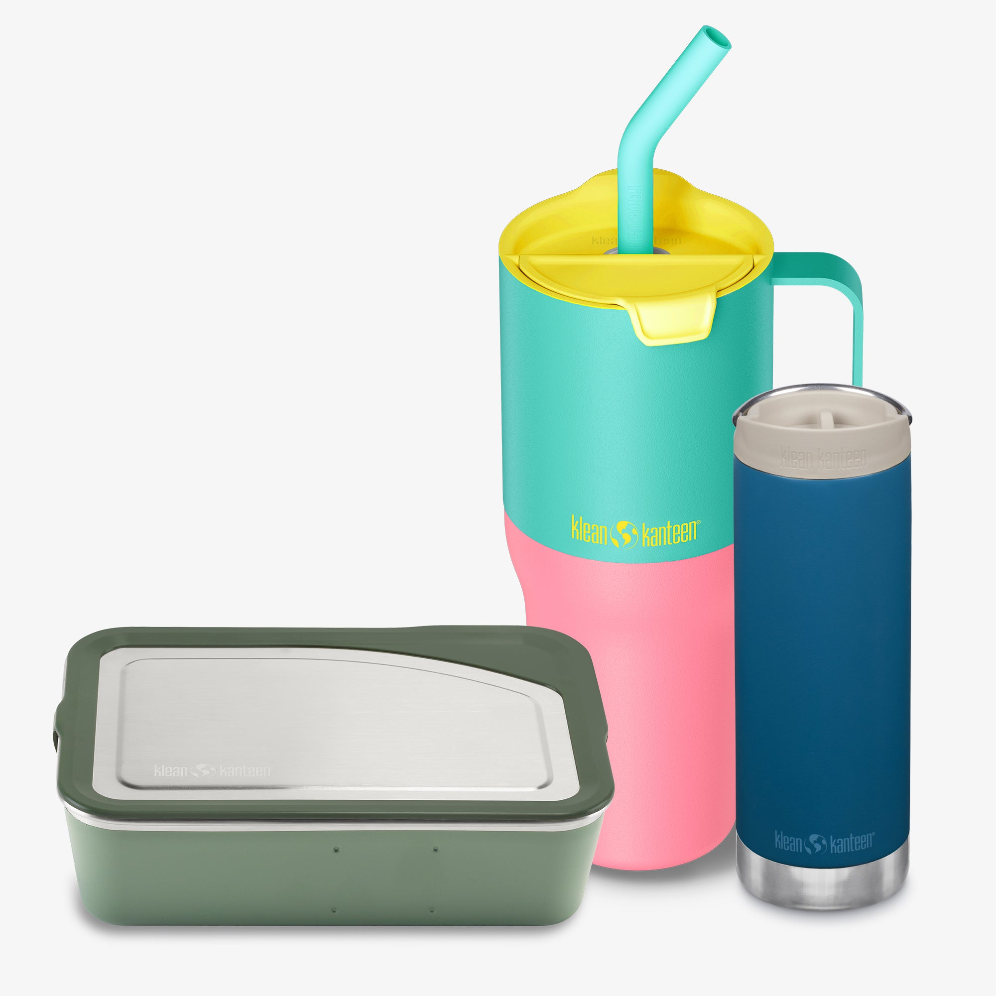 Colorful insulated tumblers and a lunch box on a white background