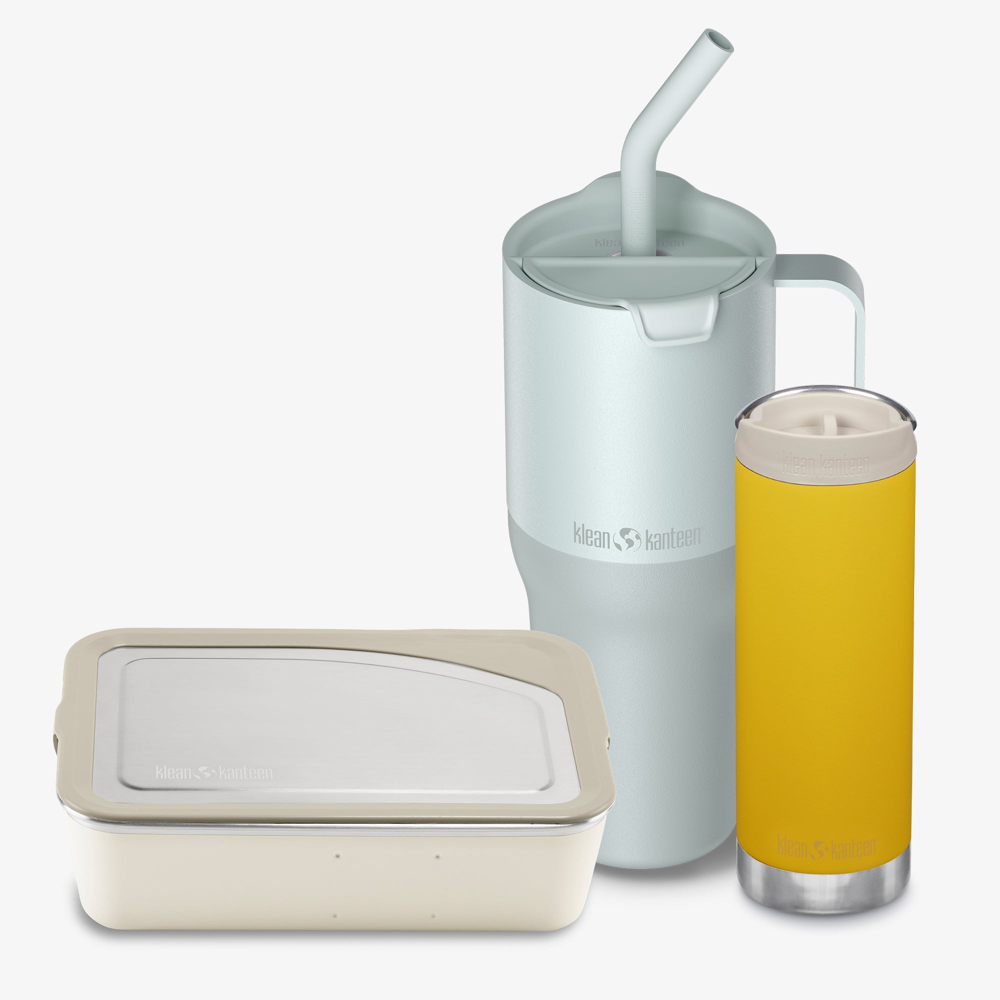 Set of insulated containers with a pitcher and a yellow tumbler on a white background