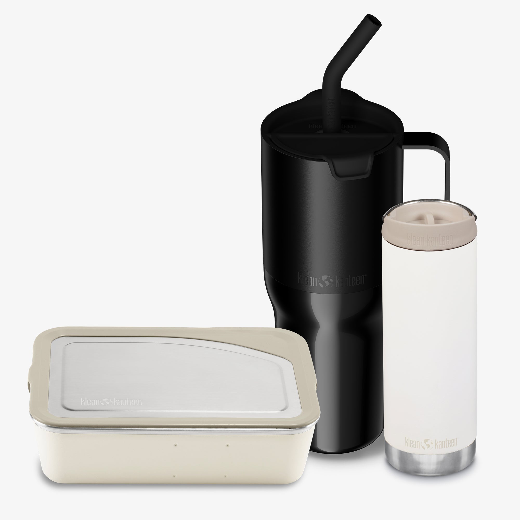 Black insulated mug with straw, beige container, and clear glass with beige lid on a white background