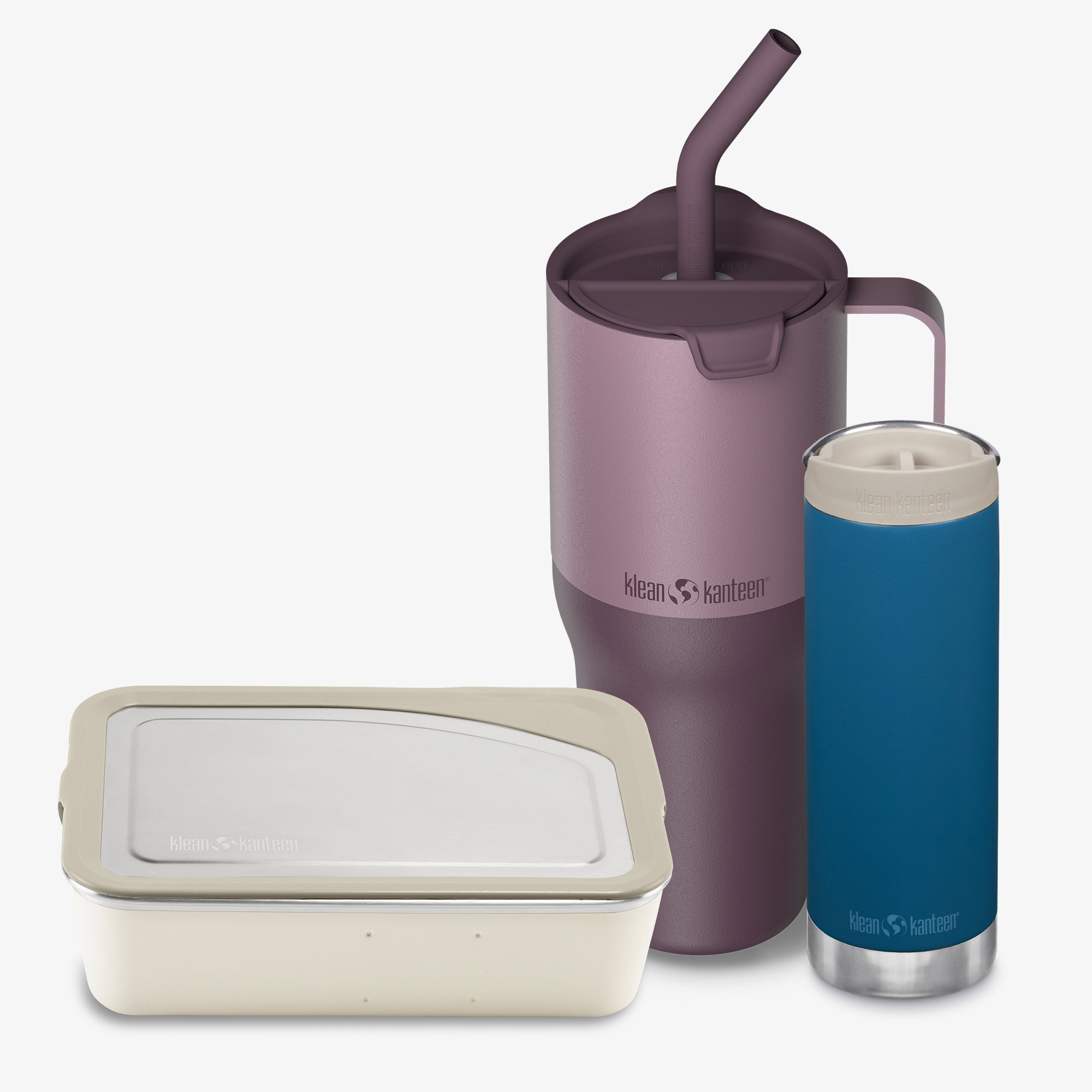 Purple insulated tumbler with straw and beige container on a white background