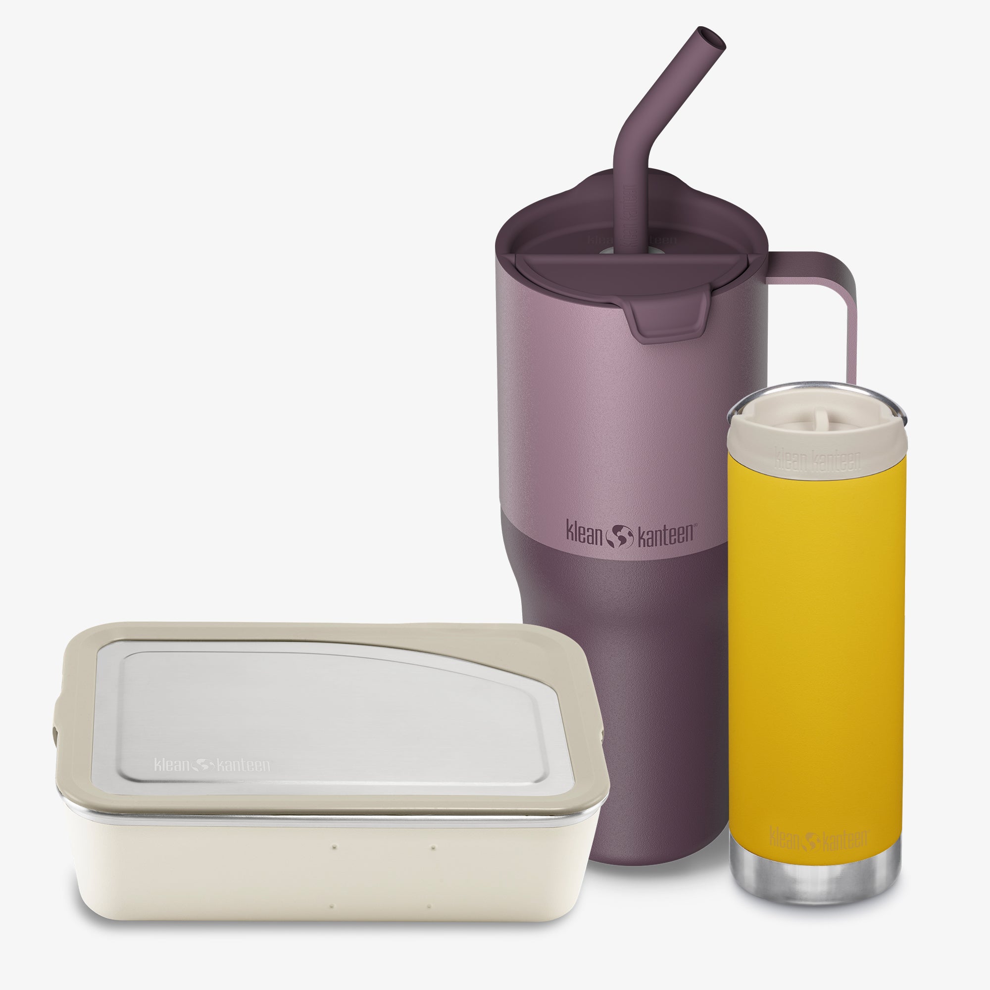 Purple tumbler with straw, beige container, and yellow cup with white lid on a white background